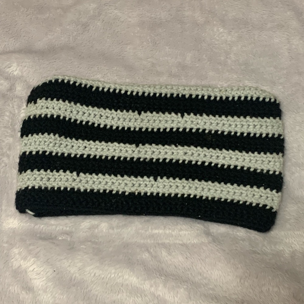 Crocheted black and gray cat hat